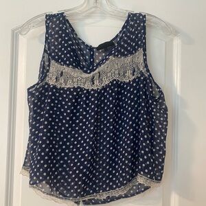 See through navy and white polka dot top